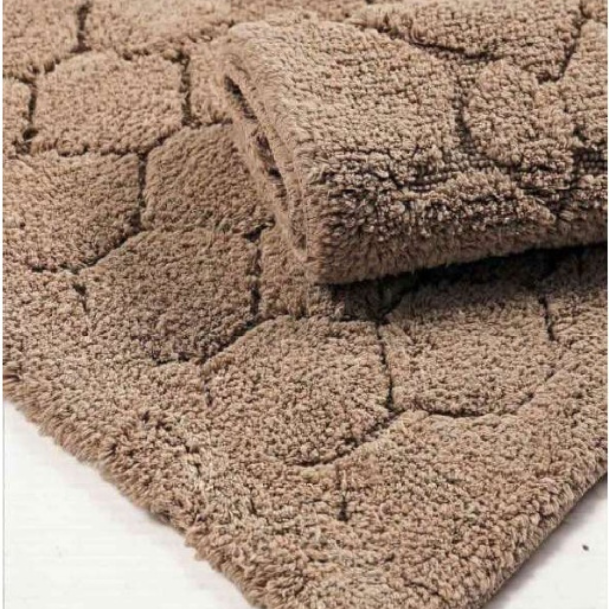 Close-up detail of tufted bath mat set model T-006